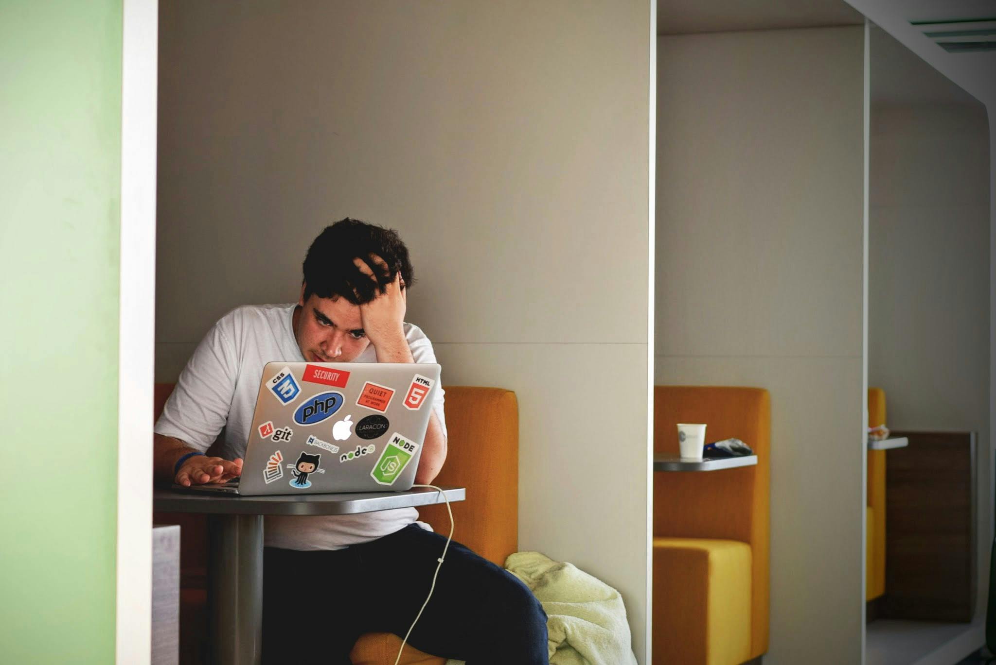Stressed programmer working late